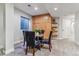 This dining room features carpeted floors, natural light, and a small dining table at 566 N Humboldt St, Denver, CO 80218