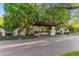 The grand entrance to the neighborhood welcomes you with a tree-lined street and manicured landscaping at 566 N Humboldt St, Denver, CO 80218