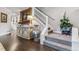 Elegant foyer with hardwood floors, staircase, and decorative accents at 566 N Humboldt St, Denver, CO 80218