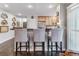 Kitchen breakfast bar featuring light wood cabinets, stainless steel appliances, and bar stool seating at 566 N Humboldt St, Denver, CO 80218