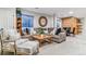 This living room offers plush seating, a wooden coffee table, and a decorative mirror at 566 N Humboldt St, Denver, CO 80218