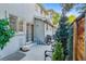 Back patio featuring a grill, landscaping, and a privacy fence at 566 N Humboldt St, Denver, CO 80218