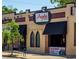 Inviting neighborhood restaurant with a classic brick and stucco facade, plus ample street parking at 566 N Humboldt St, Denver, CO 80218