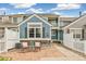 Cozy outdoor seating area with stone patio, perfect for relaxing evenings at 11386 Grove St # B, Westminster, CO 80031