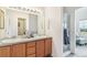 Charming bathroom with double sinks and glass shower at 11386 Grove St # B, Westminster, CO 80031