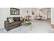 Open-concept living room with neutral decor, offering a cozy and inviting atmosphere at 11386 Grove St # B, Westminster, CO 80031