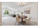Open living space with dining area, comfortable seating, and ample natural light at 11386 Grove St # B, Westminster, CO 80031