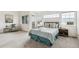 Bright main bedroom features large windows and a seating area at 11386 Grove St # B, Westminster, CO 80031