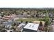 Aerial view of neighborhood including a school with large athletic field and surrounding houses at 1960 S Sherman St, Denver, CO 80210