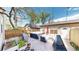 Beautiful backyard with a hot tub, comfortable seating, and a privacy fence at 1960 S Sherman St, Denver, CO 80210