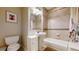 Full bathroom featuring a shower-tub combo and pedestal sink at 1960 S Sherman St, Denver, CO 80210