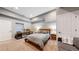 Spacious bedroom featuring a dedicated desk area and a comfortable queen size bed at 1960 S Sherman St, Denver, CO 80210