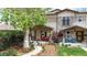 Charming home with well-manicured front yard and inviting entrance at 1960 S Sherman St, Denver, CO 80210