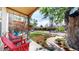 Inviting front porch with cozy chairs and well-maintained landscaping at 1960 S Sherman St, Denver, CO 80210