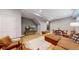 Cozy living room with hardwood floors, comfortable seating, and a dining area at 1960 S Sherman St, Denver, CO 80210