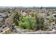 Aerial view of a verdant park, showcasing large green space and mature trees at 1960 S Sherman St, Denver, CO 80210