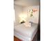 Bedroom featuring stylish bedding, side table and great natural light at 2711 Mapleton Ave # 1, Boulder, CO 80304