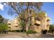 Modern condo building with a unique facade and well-maintained landscaping at 2711 Mapleton Ave # 1, Boulder, CO 80304