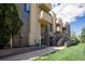 Exterior view of condos and landscaped grounds with sidewalks at 2711 Mapleton Ave # 1, Boulder, CO 80304