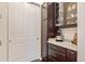 Well-organized kitchen pantry with modern cabinets and granite countertop at 25019 E Alder Dr, Aurora, CO 80016