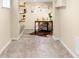 Finished basement space with a desk, decor, and comfortable seating for work or relaxation at 3123 N Elizabeth St, Denver, CO 80205