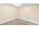 Clean, unfinished basement space with carpet flooring, ready for customization at 3123 N Elizabeth St, Denver, CO 80205