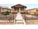 Charming brick home with a well-maintained front yard and inviting entryway at 3123 N Elizabeth St, Denver, CO 80205