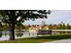 View of skyline from park including bench, lake, and trees at 3123 N Elizabeth St, Denver, CO 80205