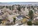 Aerial view of a Ranch style home with a large backyard and mountain views at 3 Circle Dr, Castle Rock, CO 80104