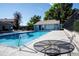 A refreshing pool features a lounge area with tables and chairs, with additional lounge seating around the pool deck at 7933 Chase Cir # 182, Arvada, CO 80003