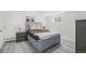 Stylish bedroom with a plush bed, modern furniture, and ample natural light at 1580 S Krameria St, Denver, CO 80224