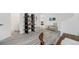 Bright living room featuring stylish decor, wood floors, and an open floor plan at 1580 S Krameria St, Denver, CO 80224