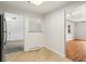 Efficient kitchen area with tile flooring and a pass-through to the living room at 8675 Calvin Dr, Arvada, CO 80002