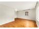 Bright and open living room featuring natural hardwood floors and ample natural light at 8675 Calvin Dr, Arvada, CO 80002