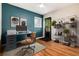 Modern office space with a stylish desk, shelving, and natural light, perfect for a productive work environment at 2415 Pontiac St, Denver, CO 80207
