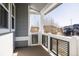 Comfortable balcony with modern railings, offering a serene outdoor space at 9575 E 3Rd Pl, Denver, CO 80230