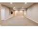 Spacious basement featuring neutral tones and a large open area perfect for customization at 9575 E 3Rd Pl, Denver, CO 80230