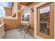 Cozy balcony with seating and an exterior entrance offers a relaxing outdoor space at 18061 E Saskatoon Pl, Parker, CO 80134