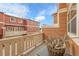 Cozy balcony featuring a charming planter and relaxing outdoor space with views of the complex's architecture at 18061 E Saskatoon Pl, Parker, CO 80134