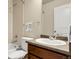 This bathroom features a sink, toilet, shower and towel racks at 18061 E Saskatoon Pl, Parker, CO 80134