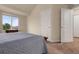Bedroom with ample closet space, plush carpet, and lots of natural light at 18061 E Saskatoon Pl, Parker, CO 80134