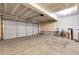 Spacious garage with concrete floor at 18061 E Saskatoon Pl, Parker, CO 80134