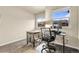 Bright office space with natural light, plush carpet, and backyard views at 18061 E Saskatoon Pl, Parker, CO 80134