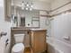 Updated bathroom features a shower-tub combination, vanity, and stylish fixtures at 8019 Wolff # G, Westminster, CO 80031