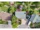 Aerial view of the house, deck, and surrounding neighborhood at 9926 W Nova Pl, Littleton, CO 80127