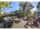 Back deck boasts ample seating and views of the backyard, perfect for outdoor relaxation and entertaining at 9926 W Nova Pl, Littleton, CO 80127