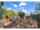 Large back deck with multiple seating areas is ideal for hosting gatherings and enjoying the outdoors at 9926 W Nova Pl, Littleton, CO 80127
