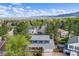 Charming home with a well-maintained lawn and mountain views at 9926 W Nova Pl, Littleton, CO 80127