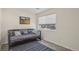 Small guest bedroom features wood-look floors and natural light at 5550 W 80Th Pl # 1, Arvada, CO 80003
