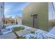 Private backyard space with modern turf, concrete pavers, and updated fencing at 1928 W 41St Ave, Denver, CO 80211